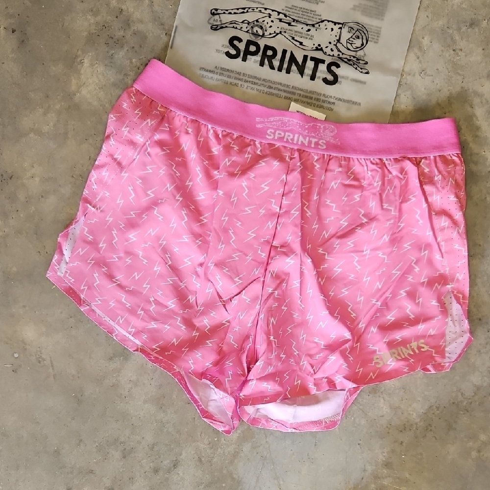 Pink Athletic Shorts with Elastic Waistband and Curved Hem